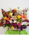 Aranjament mix cu flori colorate in cutie tip carte